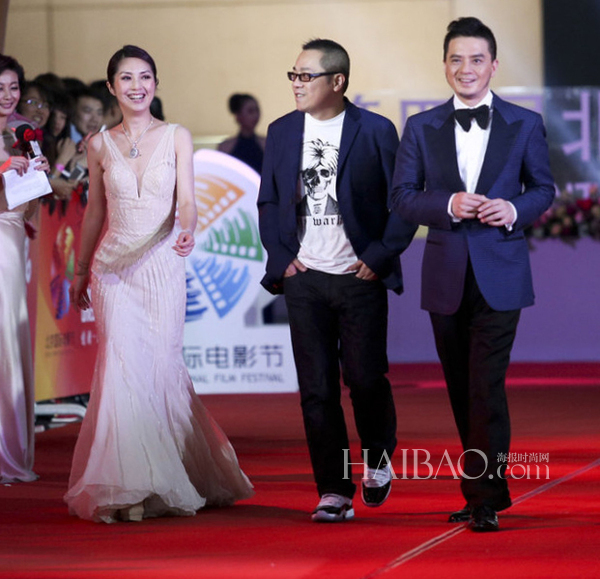 杨千嬅、黄耀明携电影《小团圆》剧组亮相2014年第四届北京国际电影节的闭幕式红毯