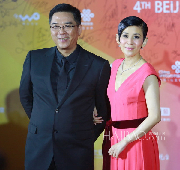 吴君如与导演关锦鹏亮相2014年第四届北京国际电影节的闭幕式红毯